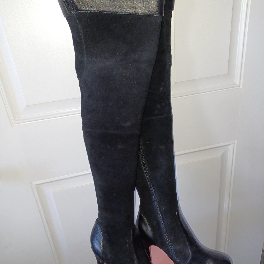 Thigh high suede 4 inch heeled boots, brand new and never worn.